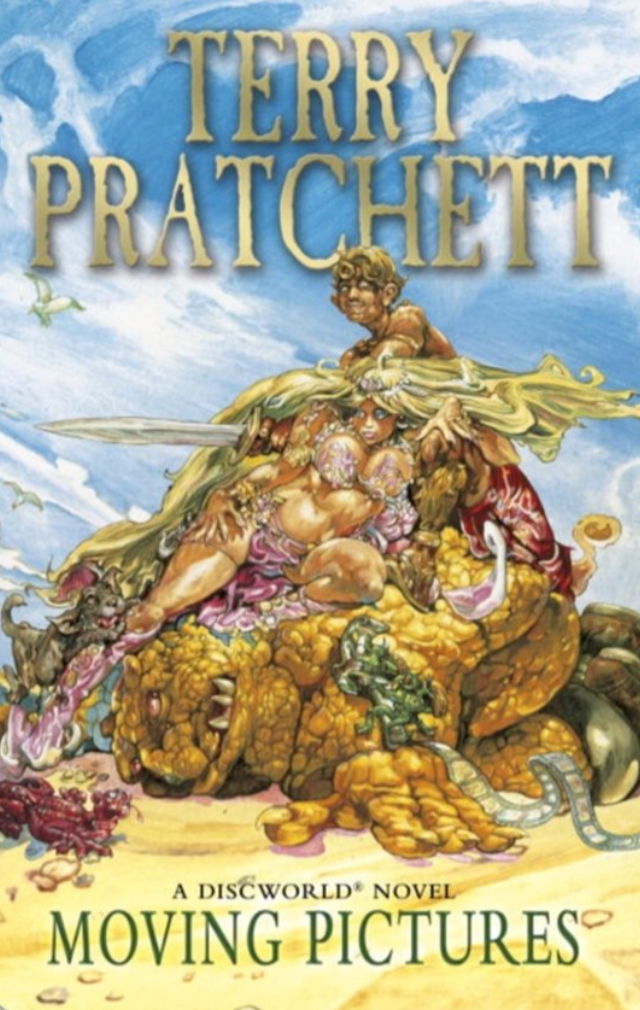 Book cover of 'Moving Pictures' by Terry Pratchett featuring a fantasy scene with a large creature and a character on its back.